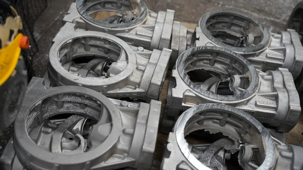 Racing automotive aluminum castings staged after casting
